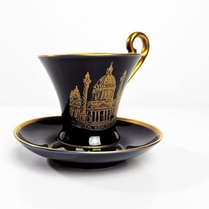 Small cup and saucer gold and cobalt blue